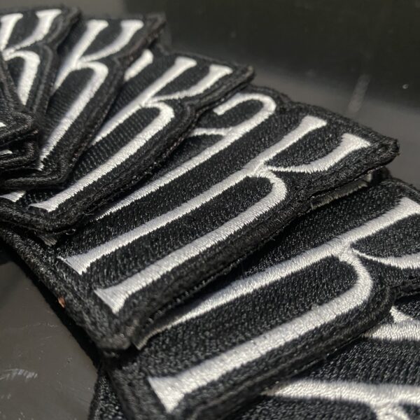 Patch bordado AK
